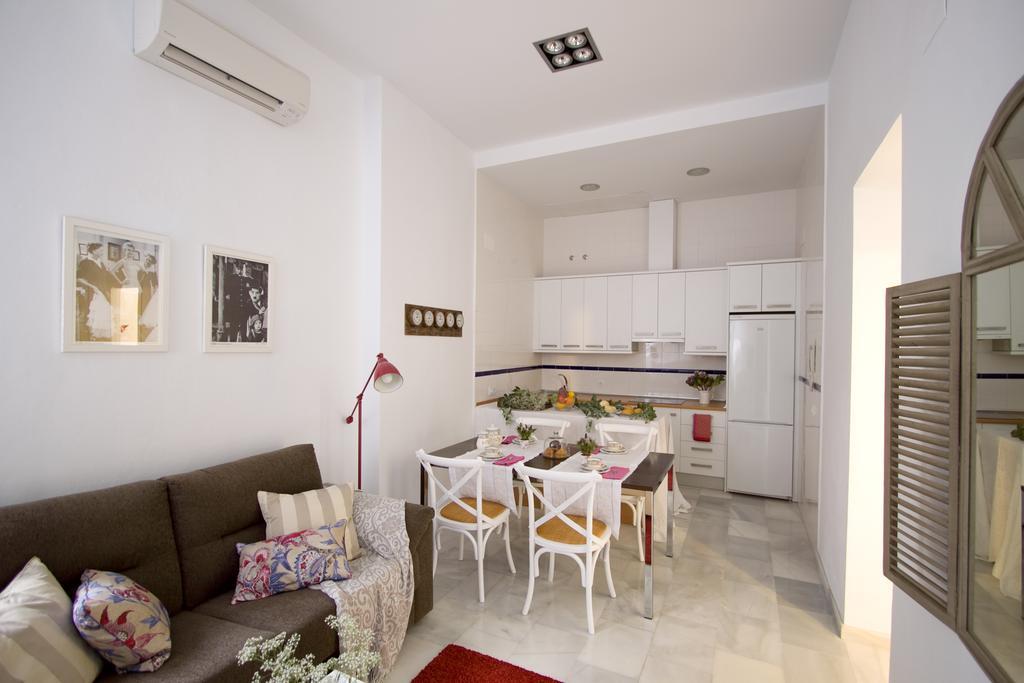 Apartamentos Plaza Pilatos Sevilla Bagian luar foto