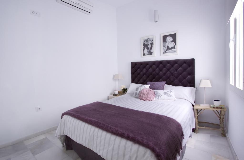 Apartamentos Plaza Pilatos Sevilla Bagian luar foto