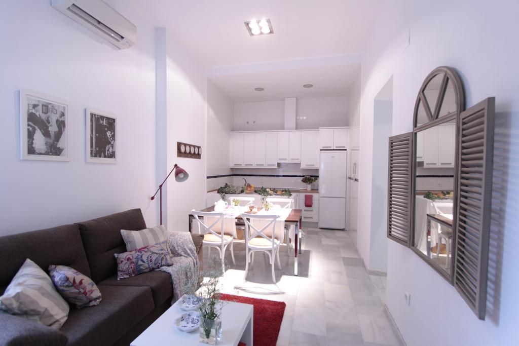 Apartamentos Plaza Pilatos Sevilla Bagian luar foto